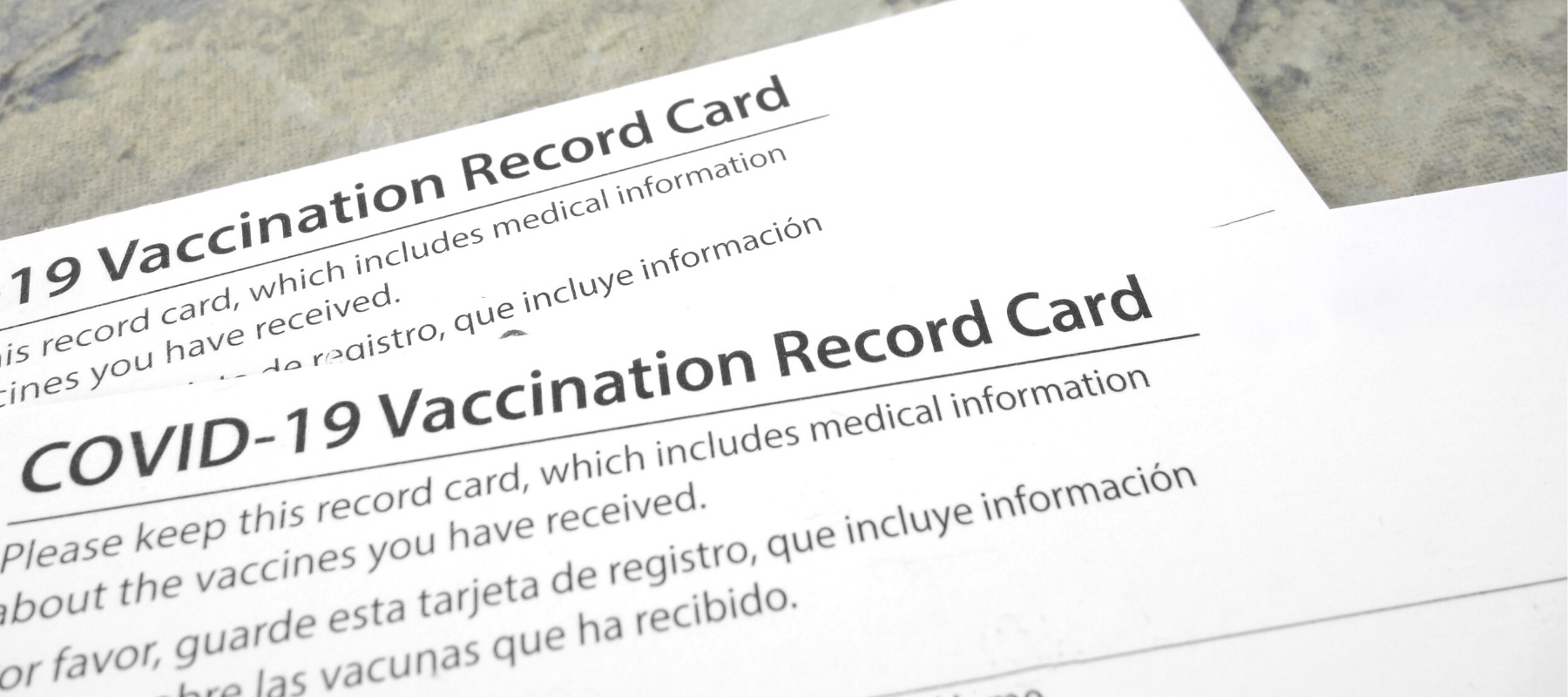 COVID-19 Vaccination Record Cards serving as proof of a COVID-19 Vaccination