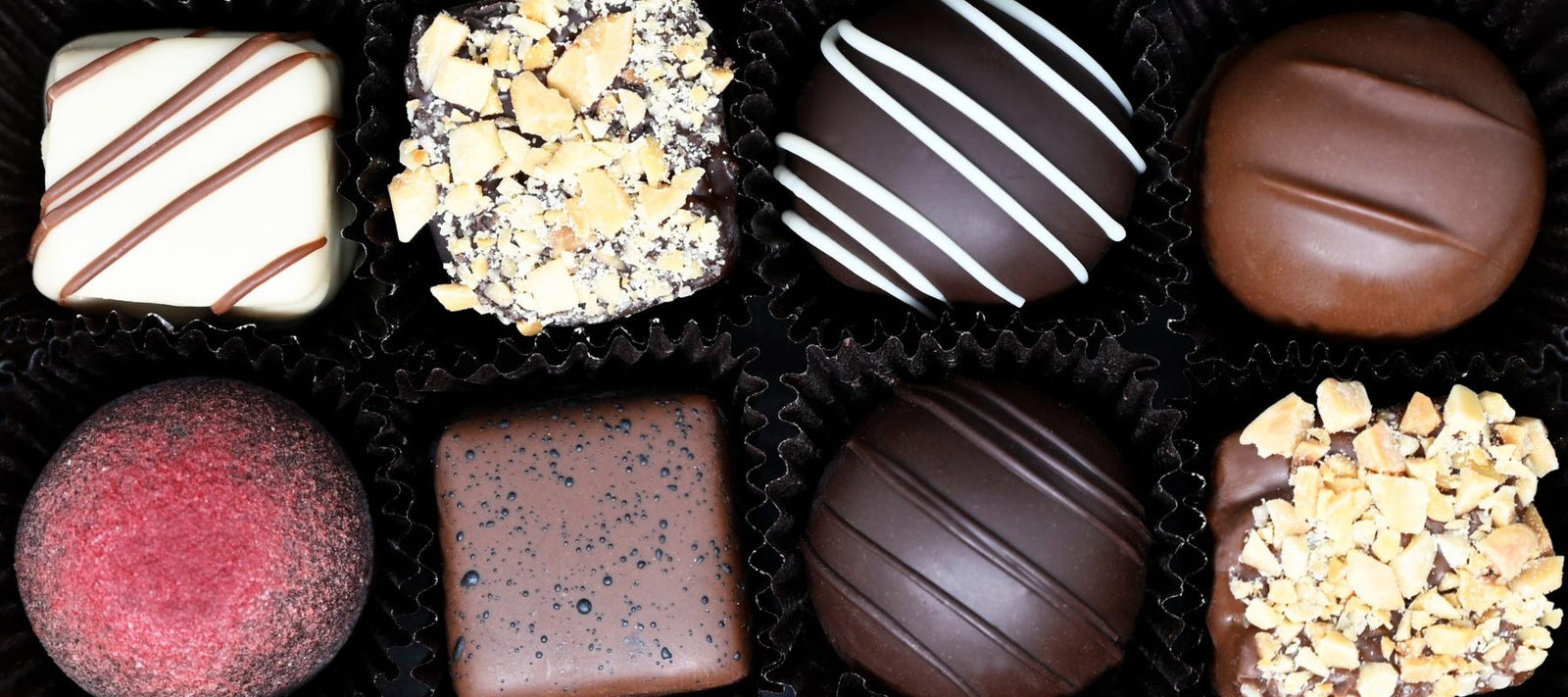Dilettante Chocolates Custom Chocolate Truffle Assortments featuring unique caramel, truffle, and toffee flavors