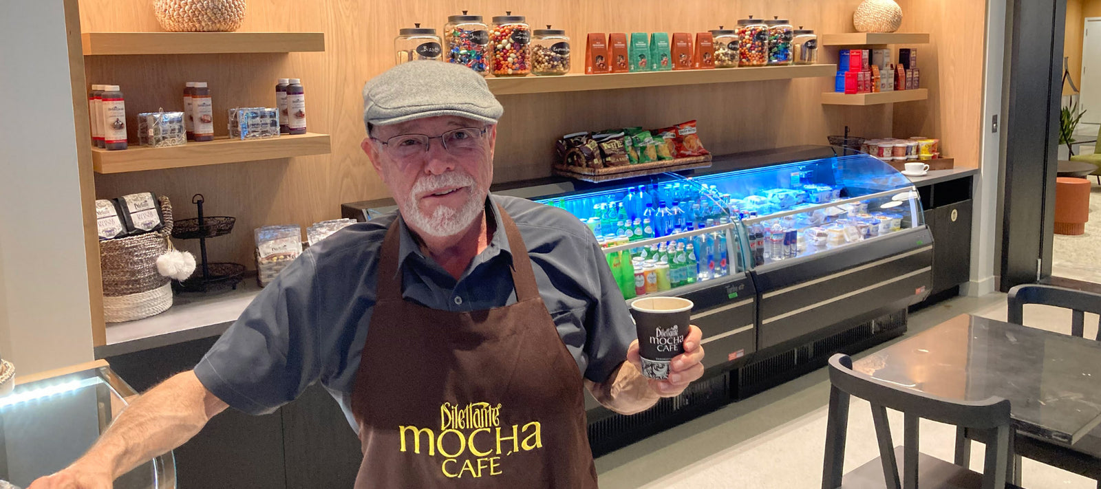 Dilettante's Founder, Dana Davenport enjoying a Mocha at the Plaza Center Café 