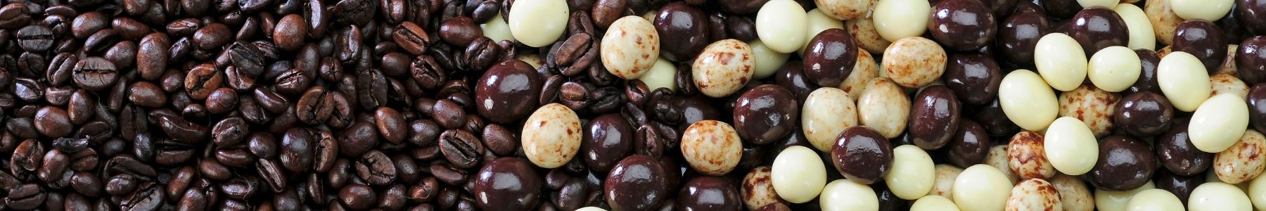 Dilettante Chocolates Chocolate-Covered Espresso Bean Header Featuring Espresso Beans in White, Milk, Dark, and Marbled Chocolate