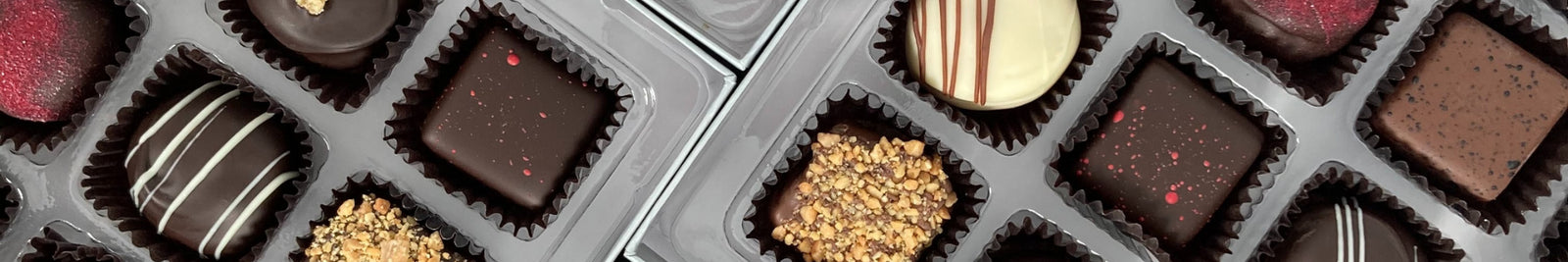Dilettante Chocolates handcrafted truffles featuring milk, dark, and milk chocolates