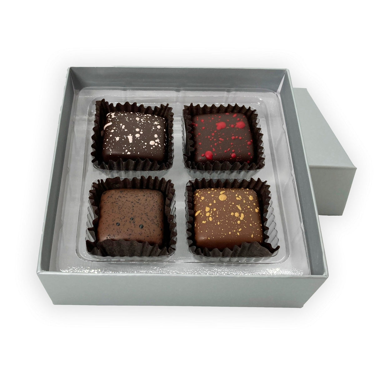 Dilettante Chocolates 4-Piece Salted Caramels in an elegant silver gift box